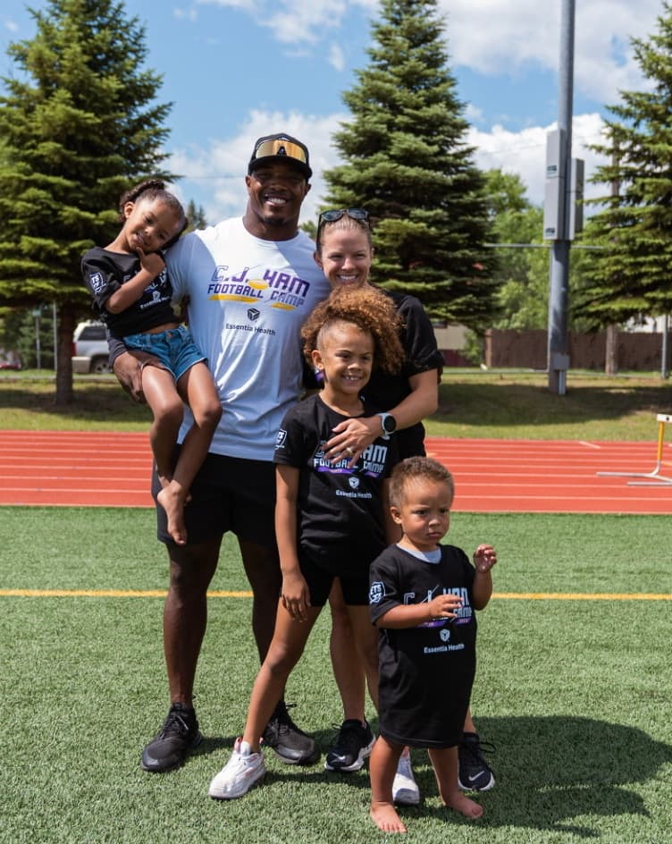 C.J. and Stephanie Ham with their three children